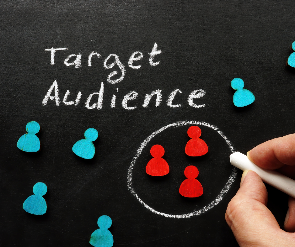 Two people discussing targeting capabilities on laptop